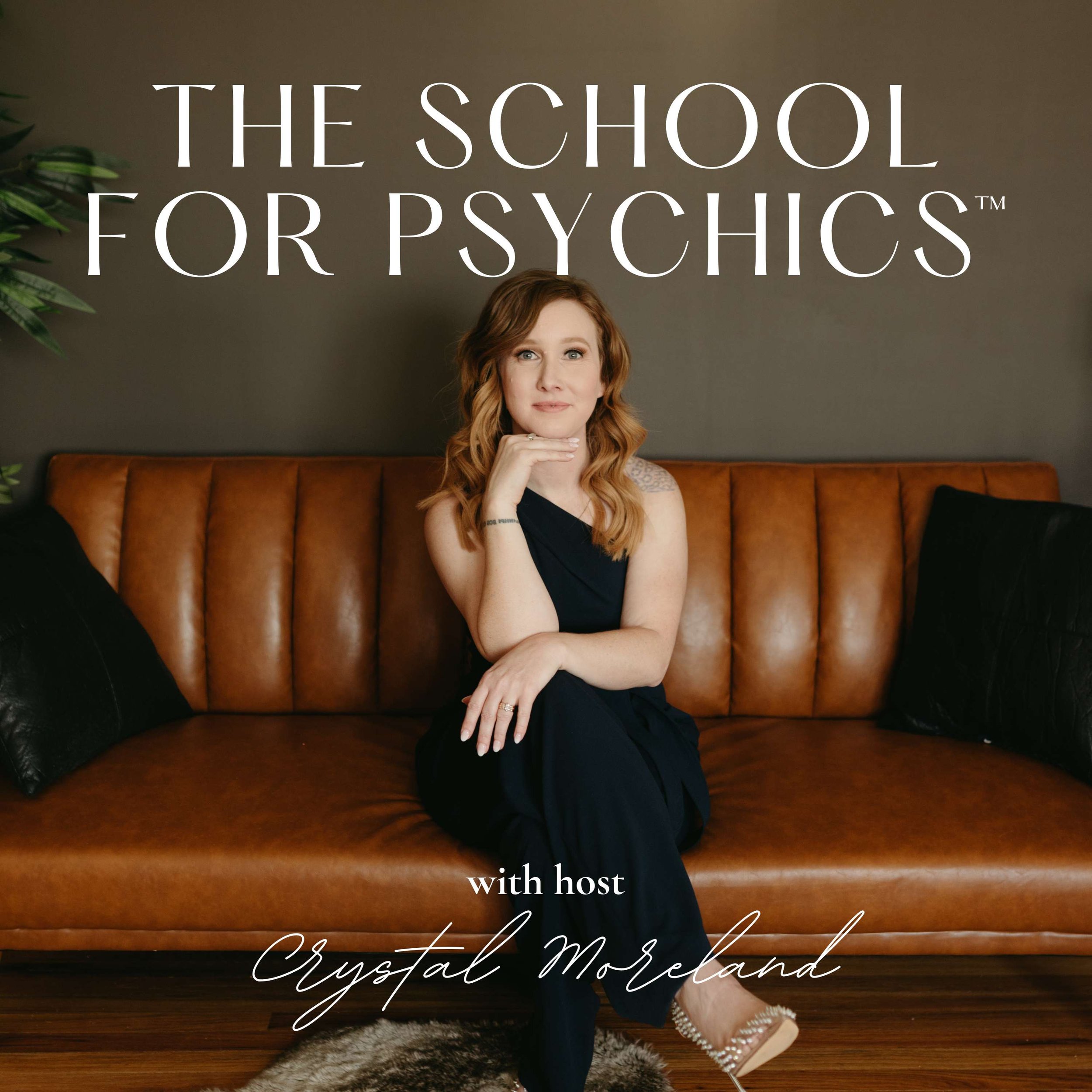 Cover photo of 'The School for Psychics' podcast featuring host Crystal Moreland, sitting on a brown leather couch with black pillows, in a cozy room with a green plant and a brown wall.