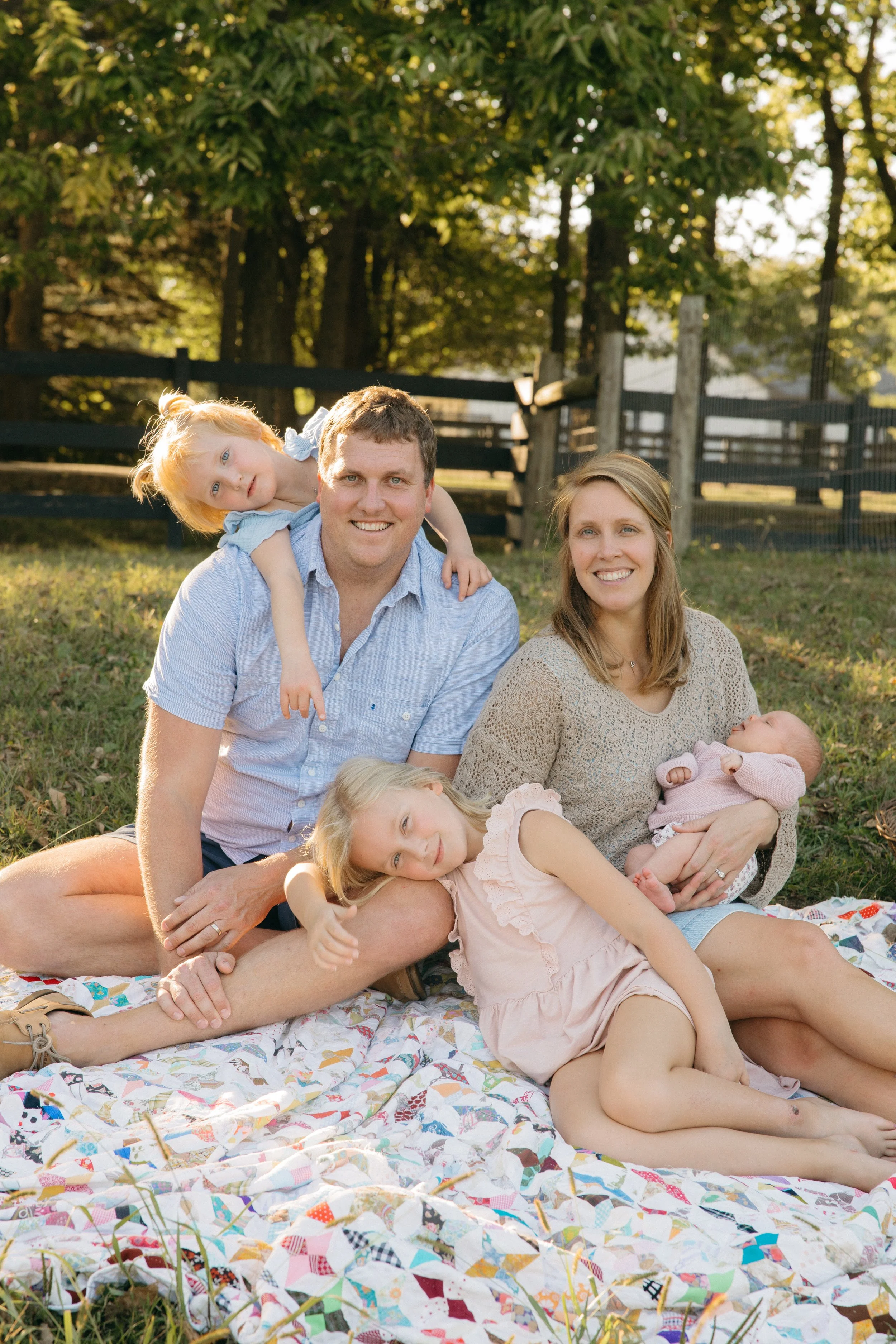 ISR program. Infant swimming resource. Swim lesson instructor, Lindsey Hehman, sitting with her family. Expert in survival swim lessons. knowledgeable and experienced with children