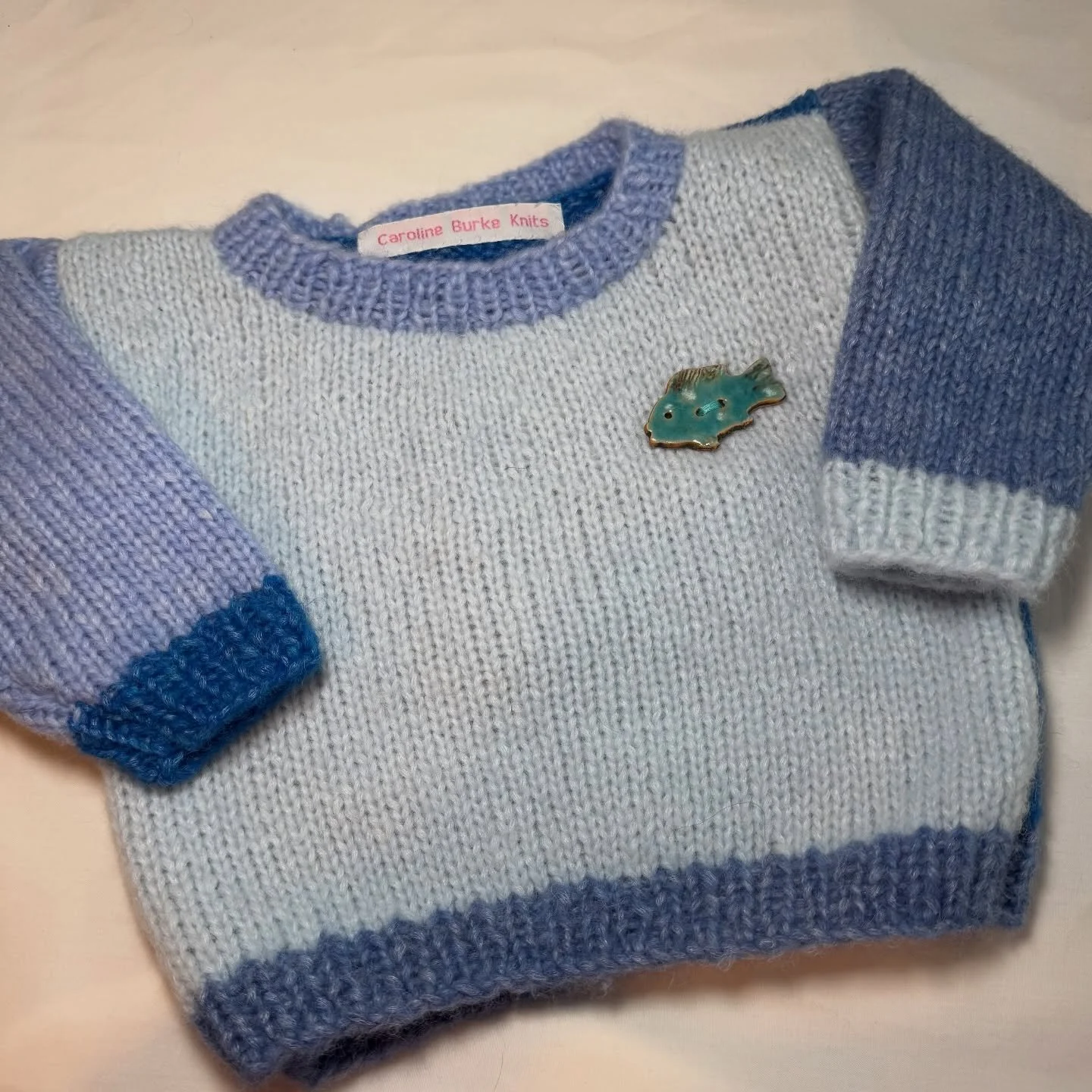 This lil guy is available now. 12 mo size. DM for info. 🐟🐠🎣 #kidsclothing #fishsweater. #handknit