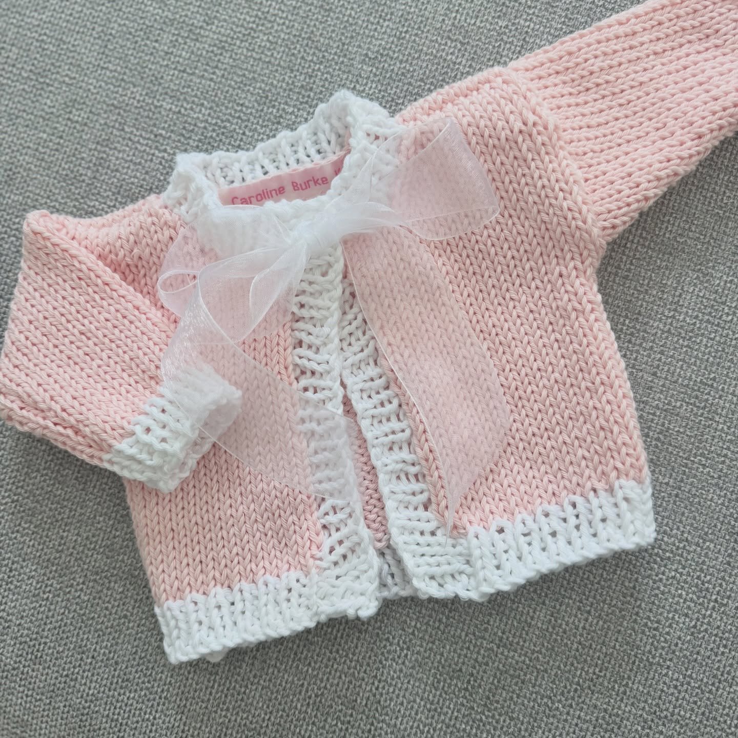 Sweet, soft, and handmade with love 💕 
0&ndash;3 month handknit sweater in delicate pink with ribbon trim 🎀 Perfect for newborn photos, gifts, or bringing baby home. 

✨ One of a kind 
🧶 Handmade 
📦 Ready to ship 

DM to claim!
#handknitbaby #new