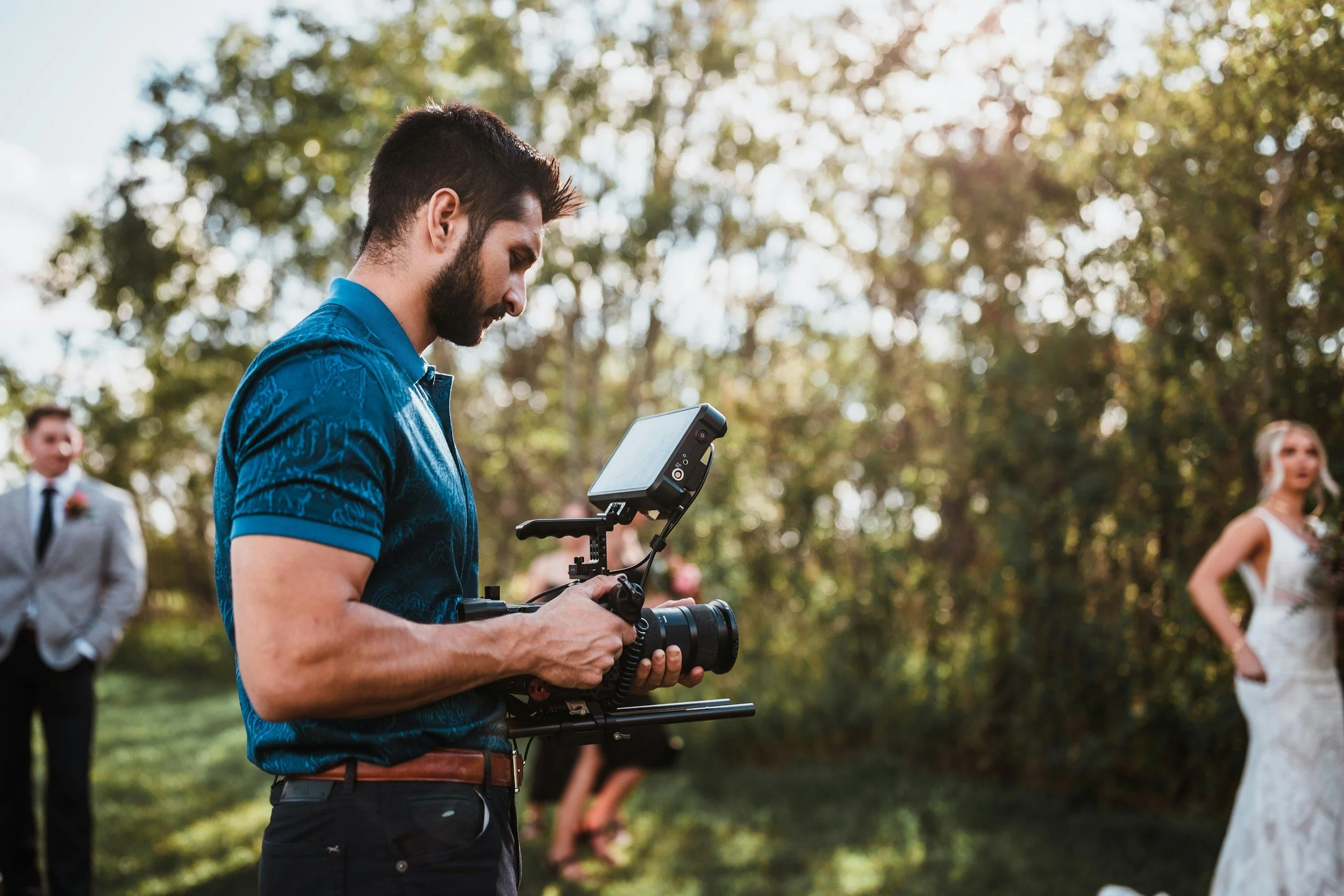 Photographer preparing for a wedding group photo