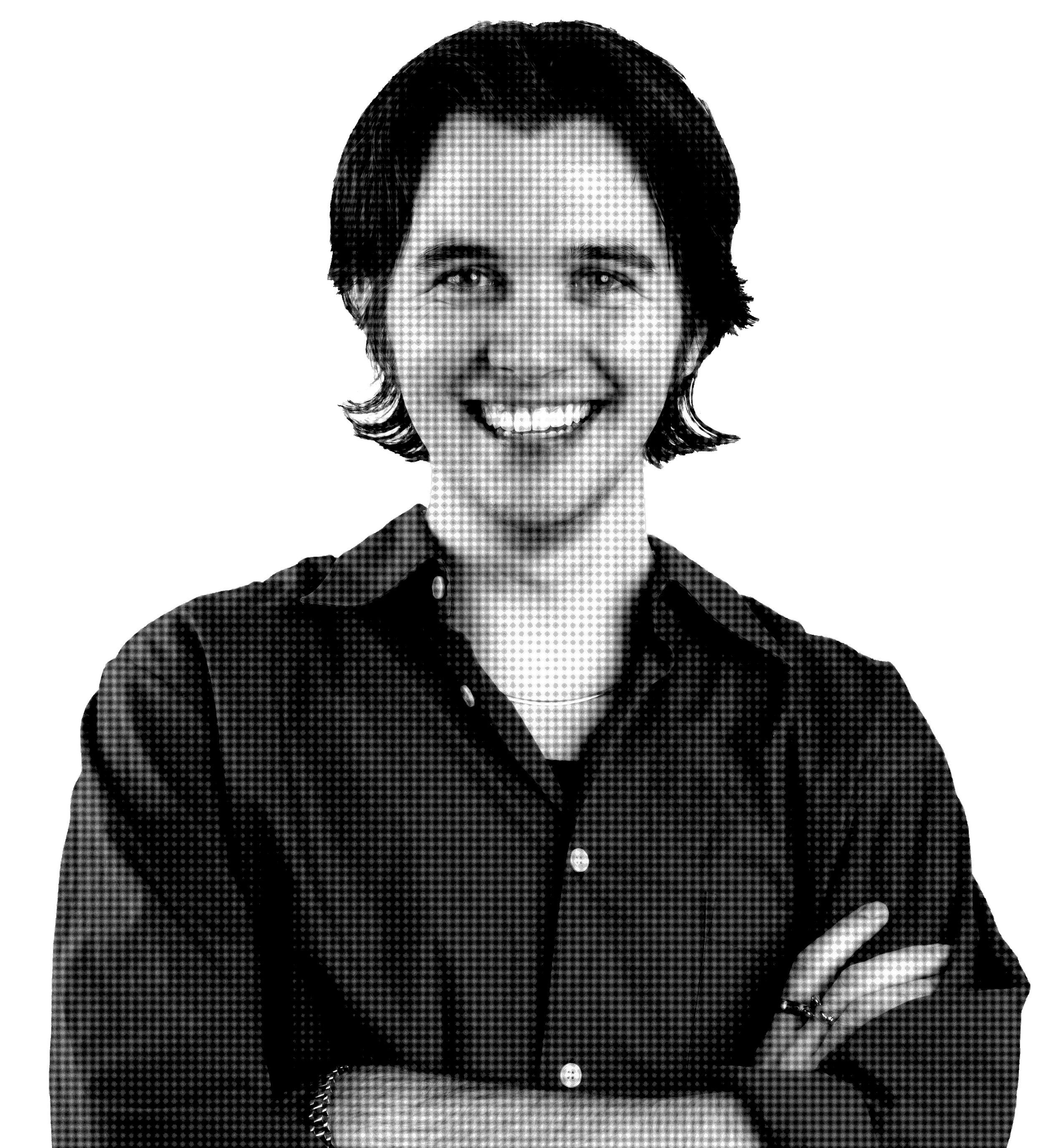 Black and white portrait of a smiling woman with short dark hair, wearing a button-up shirt with sleeves rolled up, and crossing arms, against a solid black background.