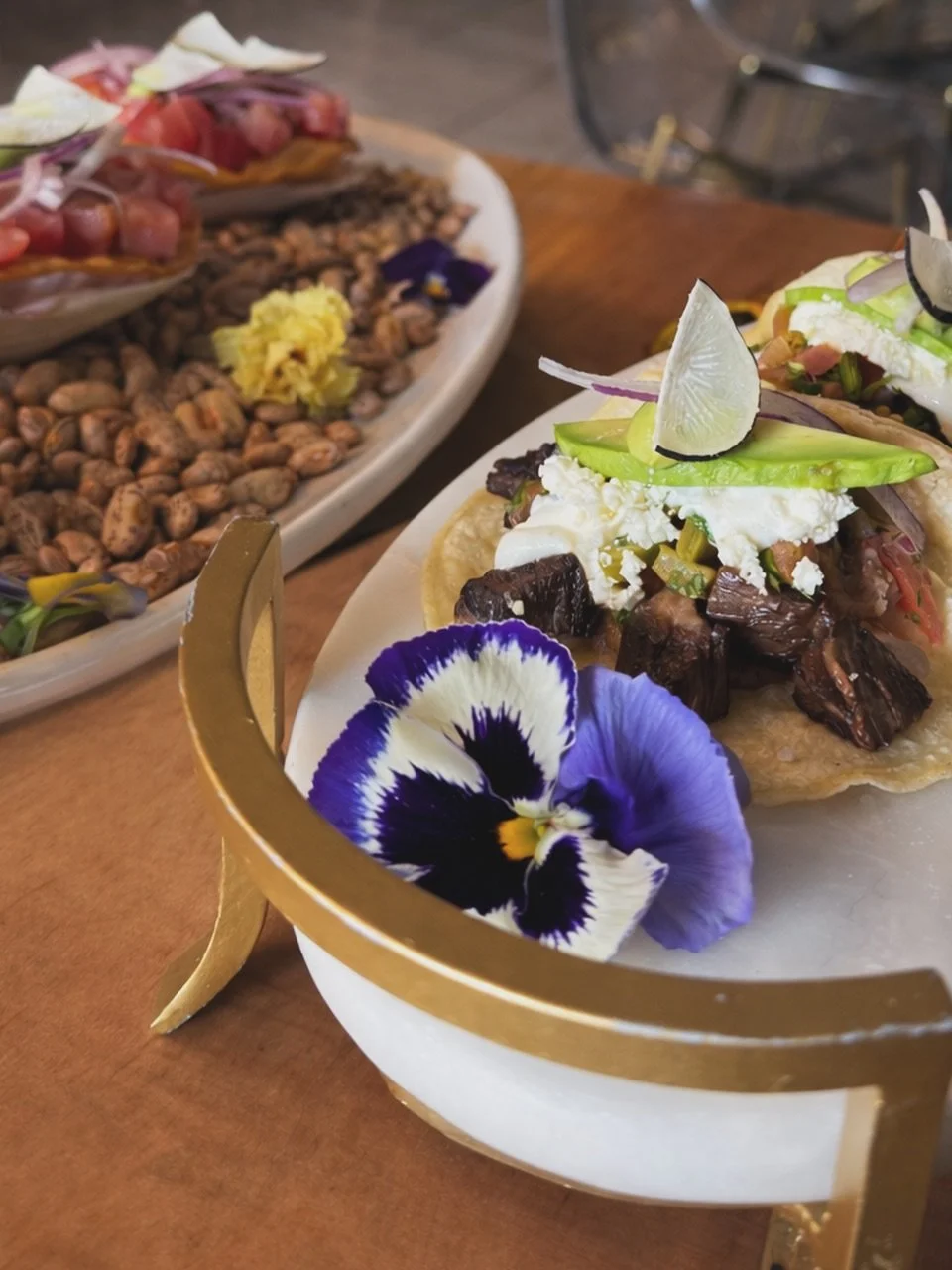 A dish that speaks before the first bite. 🌸
Bold flavors, refined presentation.

Your table is waiting.