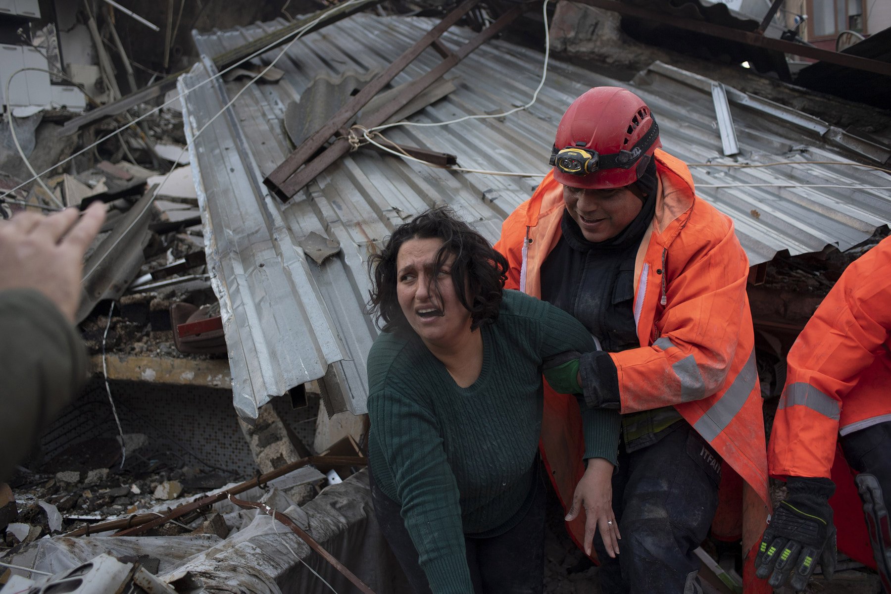 ANTAKYA, TURKEY, FEBRUARY 7, 2023. A woman getting rescued 24 hours after her buidling collapsed due to a 7.8-magnitude eathquake.