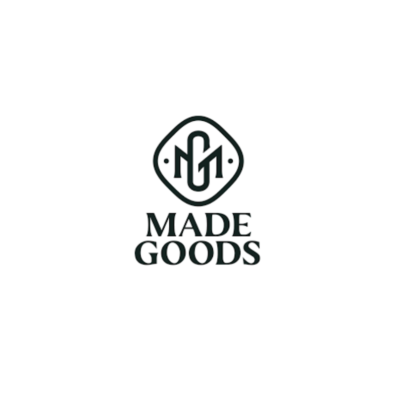 Logo with stylized letter design above the words 'MADE GOODS' in bold capital letters.