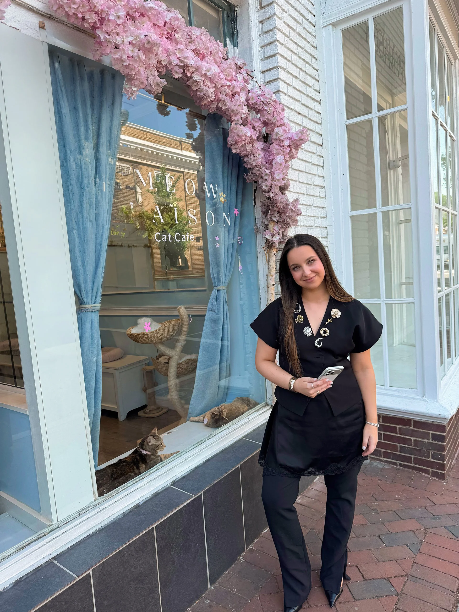 Sloane Bernstein, founder of Sloane Strategy, with client Meow Maison Cat Cafe in Washington DC.