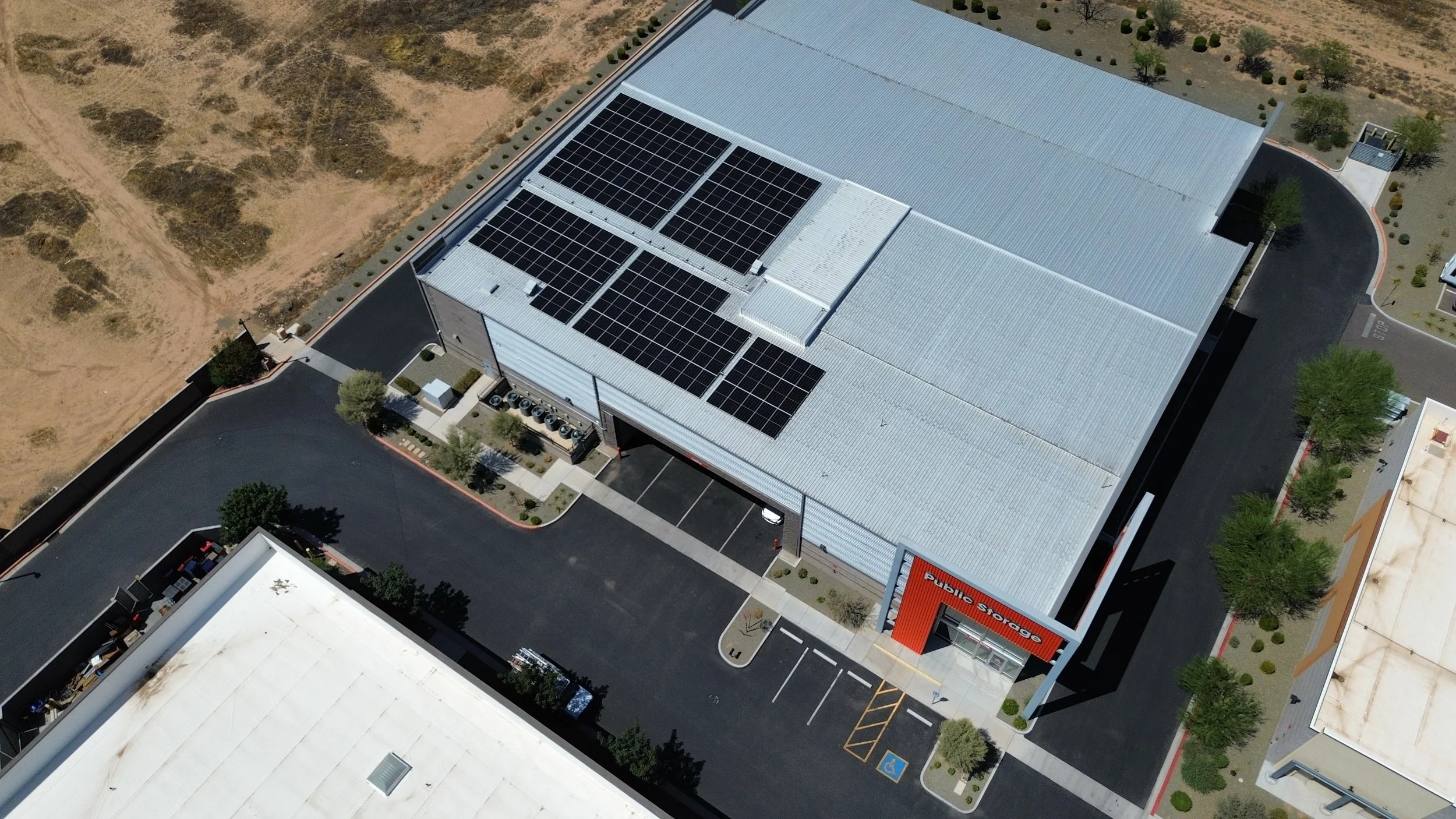 Aerial view of a building with solar panels on the roof labeled Public Storage in Las Vegas