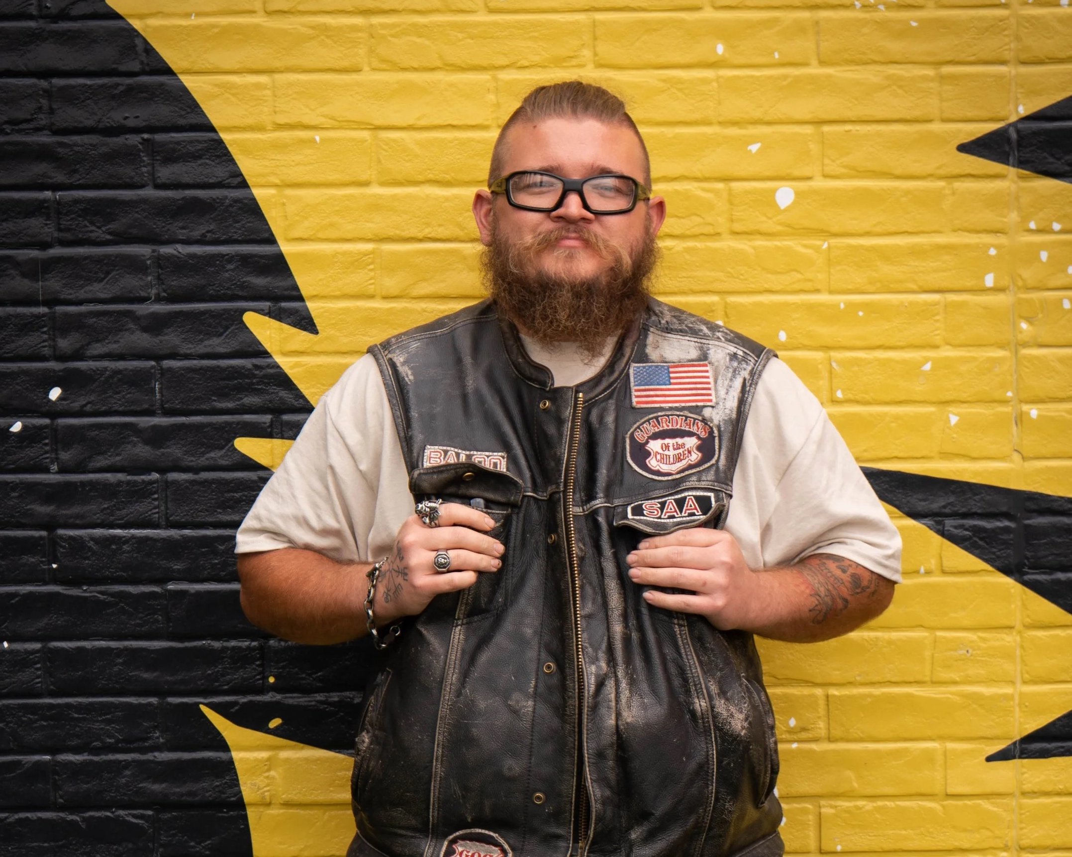 Placeholder image with red background and patch for Guardian of the Children, Big Sandy Chapter.