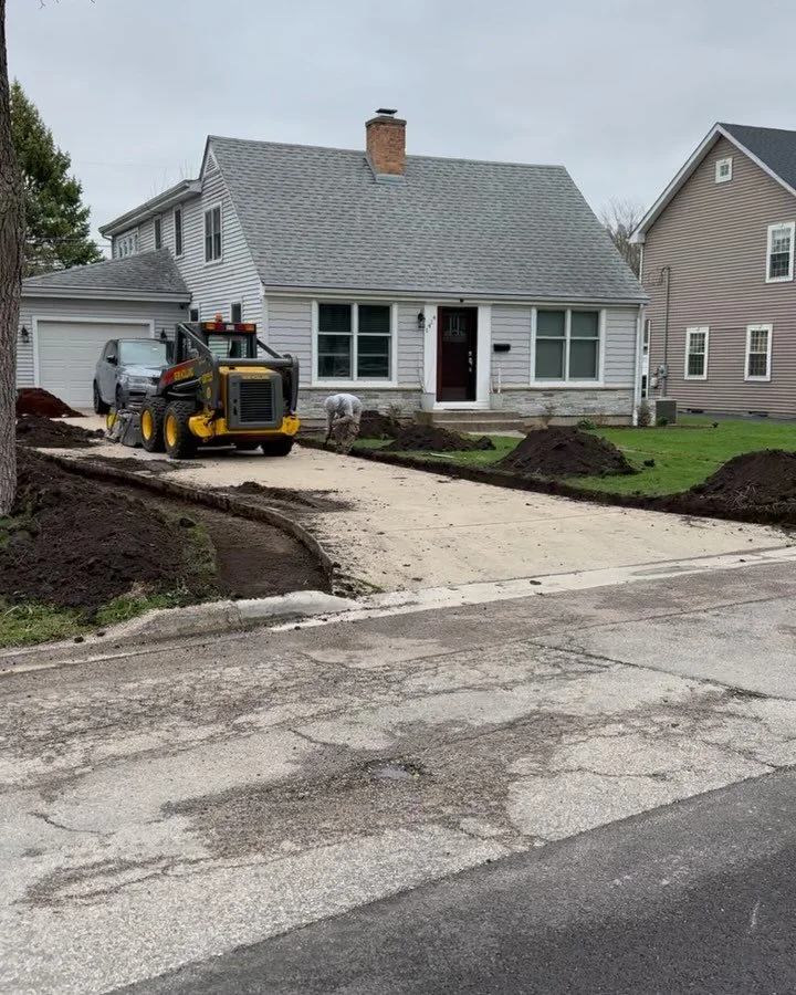 Beautiful driveway expansion with a new walkway and some beautiful plants. Enjoy.