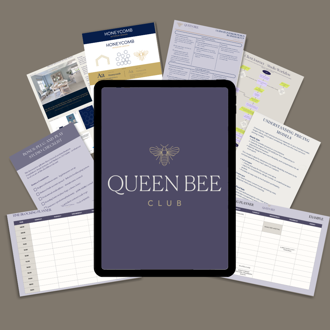 A tablet displaying the Queen Bee Club logo surrounded by various papers and documents, including a client journey workflow, interior design business setup plan, studio checklist, pricing models, a planner, and design sample sheets, all spread out on a flat surface.
