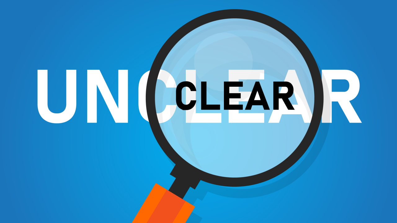 Magnifying glass with the words "UNCLEAR" and "CLEAR" underneath, indicating the effect of zooming in or clarifying.