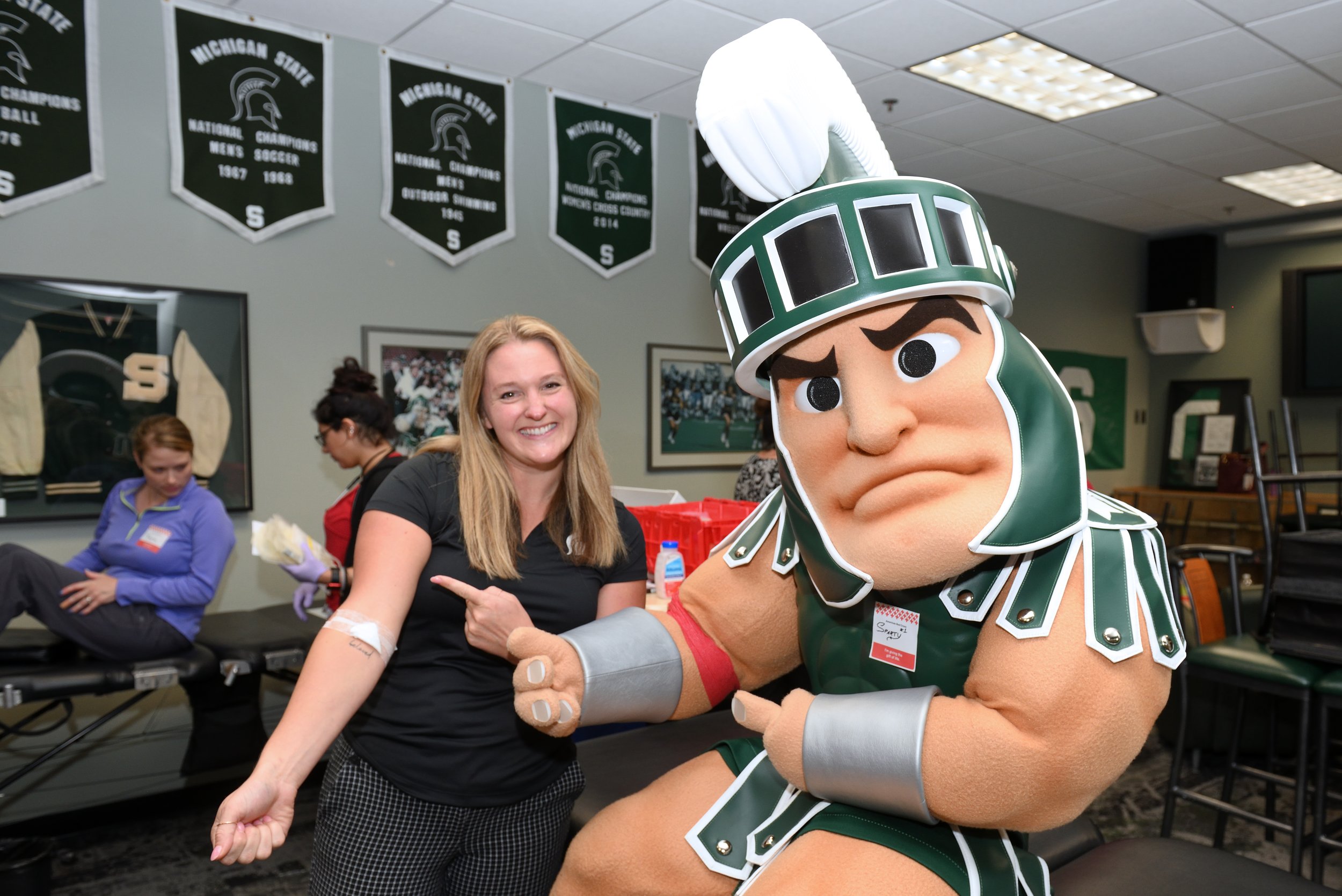 Sparty getting blood drawn