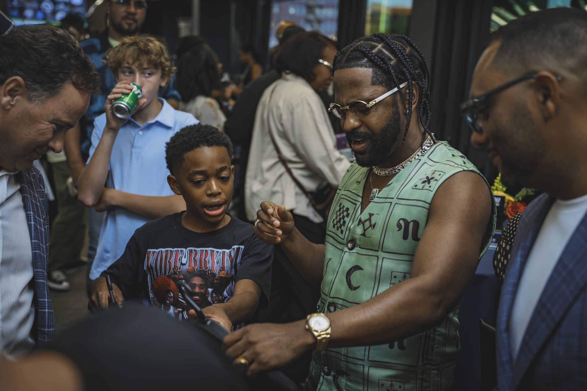 Big Sean and fan with shirt