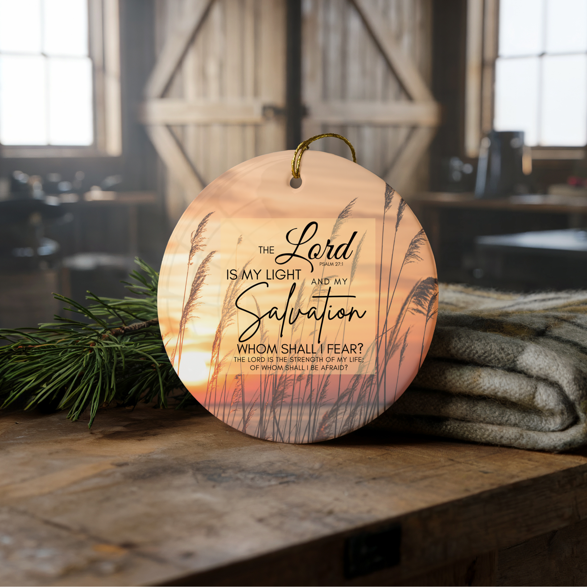 Decorative ornament with a biblical quote on a ceramic surface.