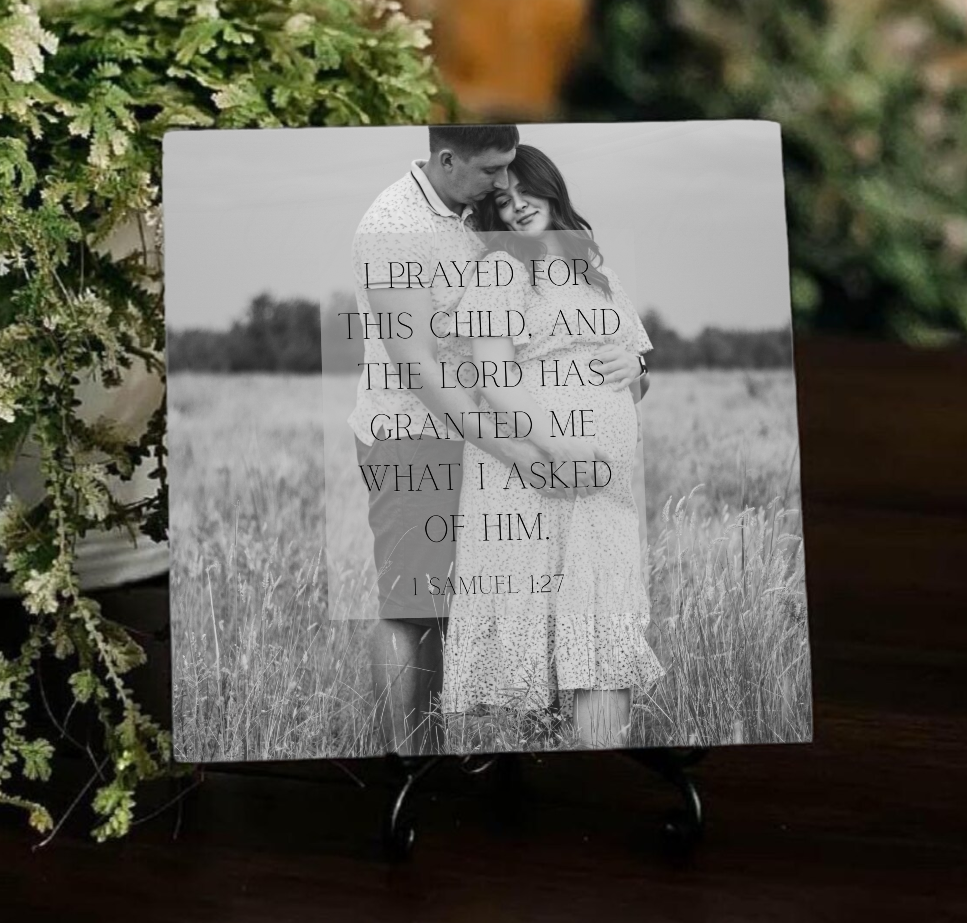 Decorative tile with inspirational quote against a scenic background