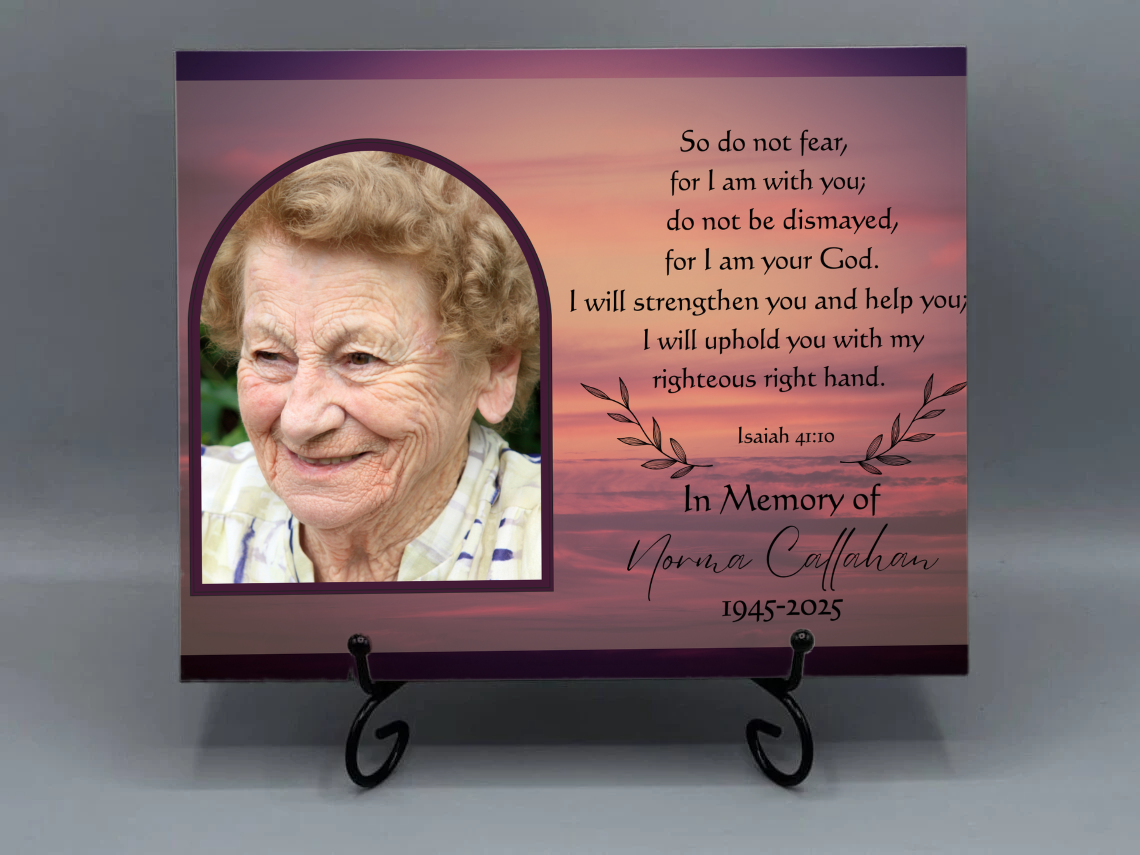 Decorative tile with inspirational quote against a scenic background