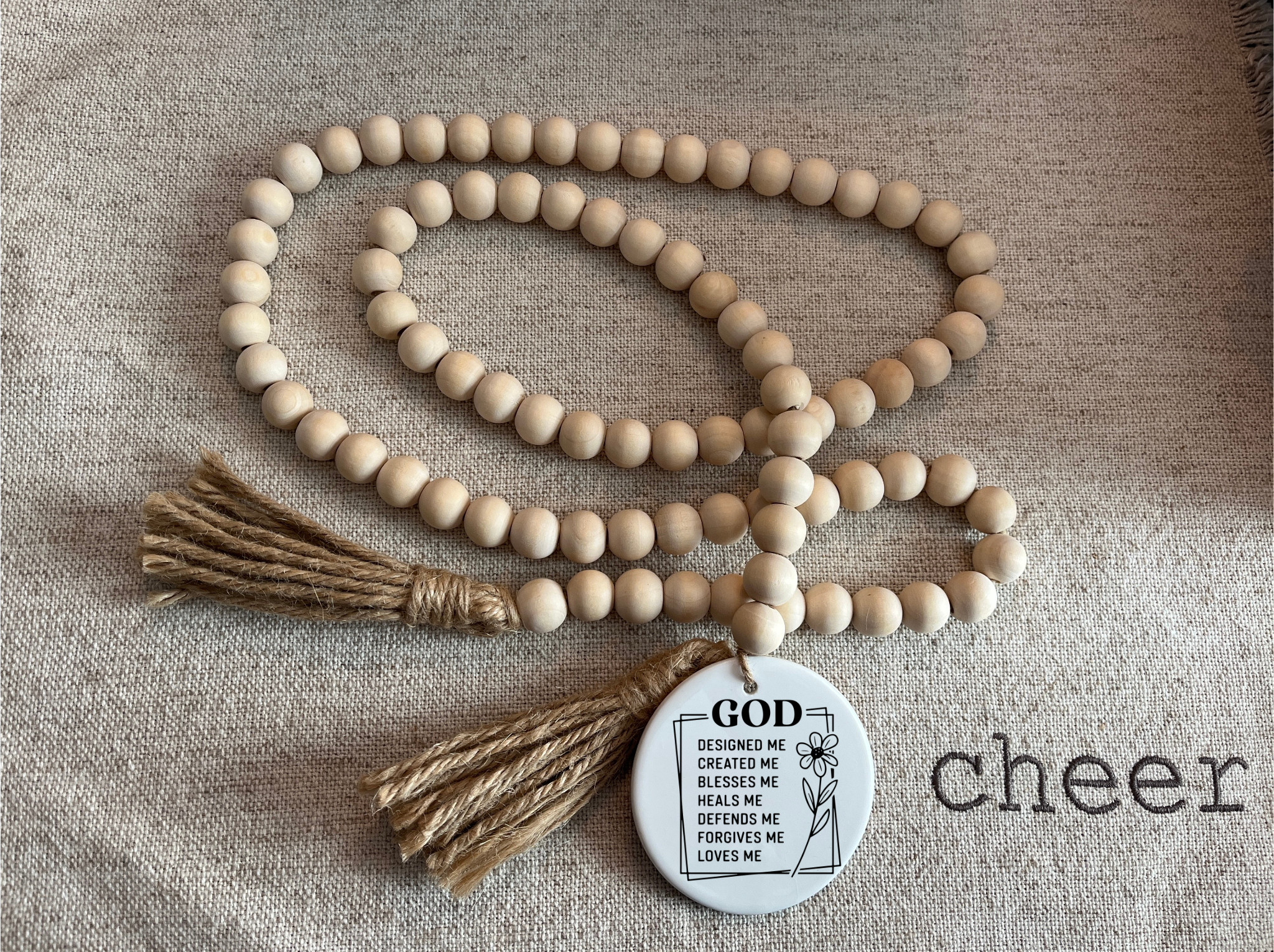 God Designed Me Wood Bead Garland with Ceramic Scripture Tag