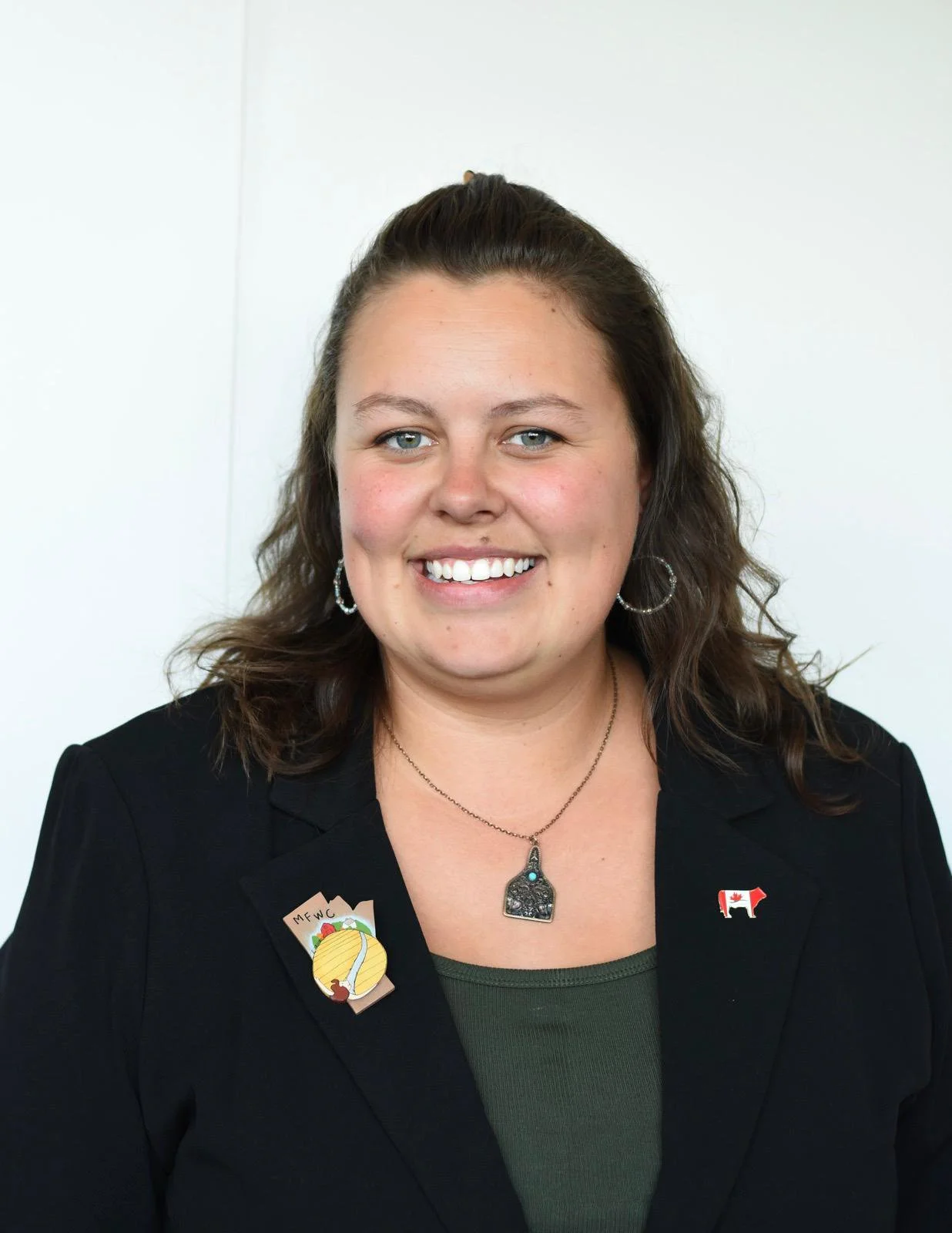 Woman with cowboy hat smiling