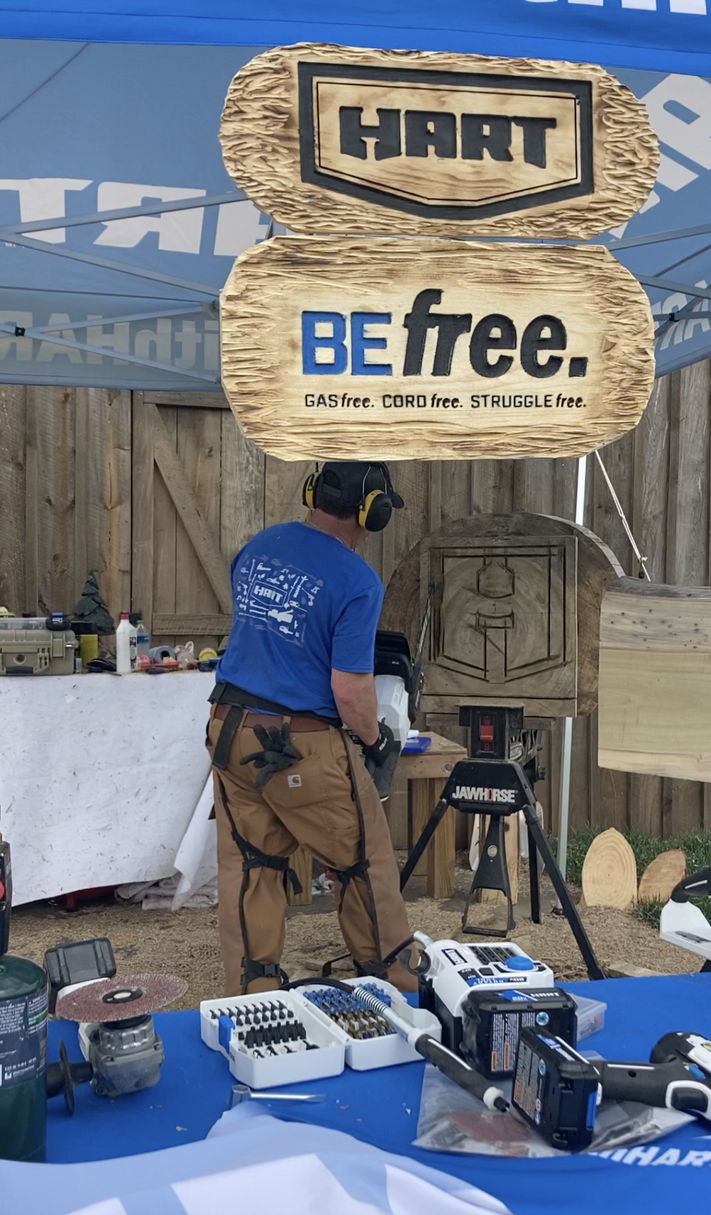 Chainsaw artist at Outdoor Power Influencer event close up.png
