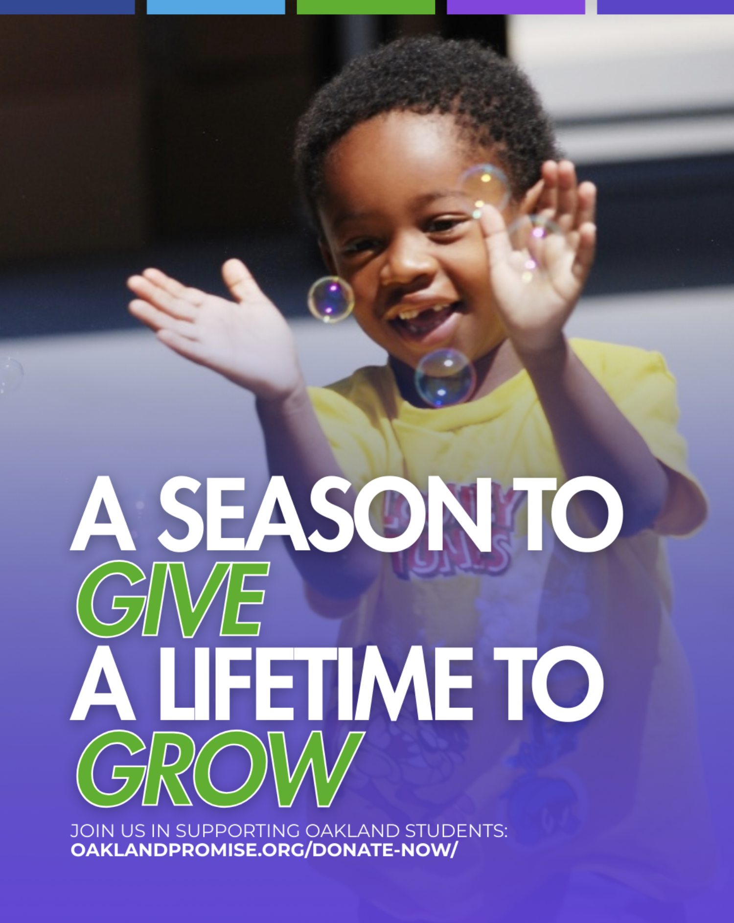 A smiling young child playing with bubbles outdoors, promoting a charity supporting Oakland students.