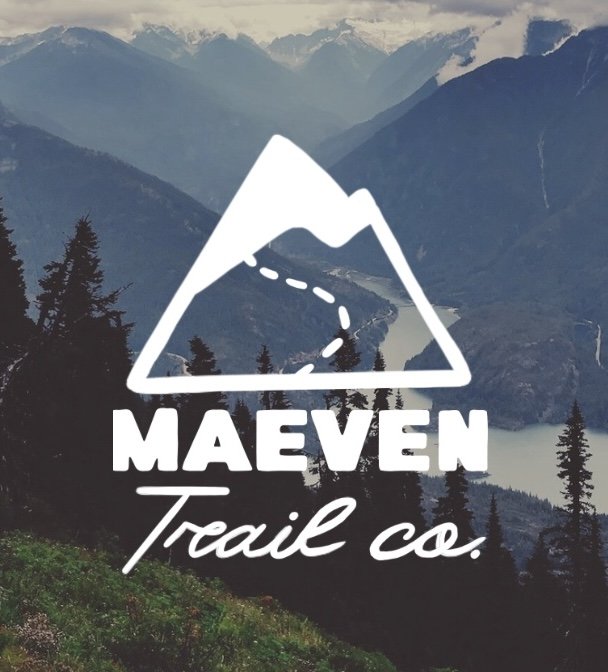 Mountain landscape with trees and river, overlaid with a white logo of a mountain and the text "MAEVEN Trail co."