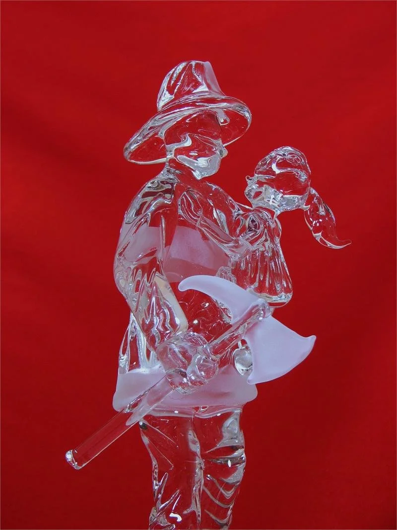 Fireman with Small Girl