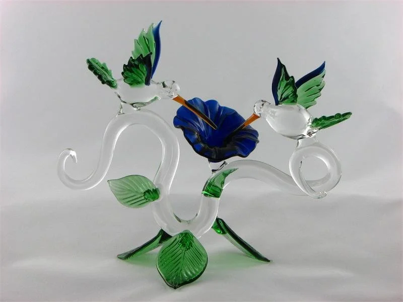 Double Hummingbirds with Flower