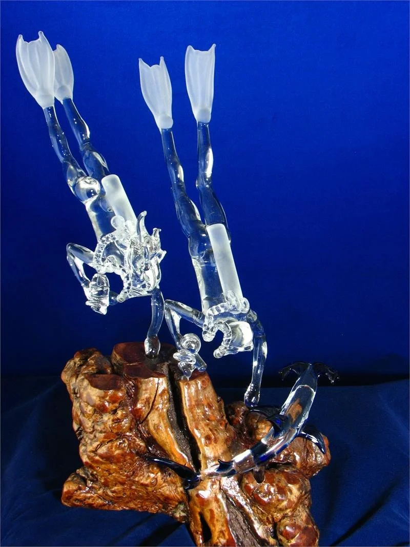 Male and Female Scuba Divers with Shark