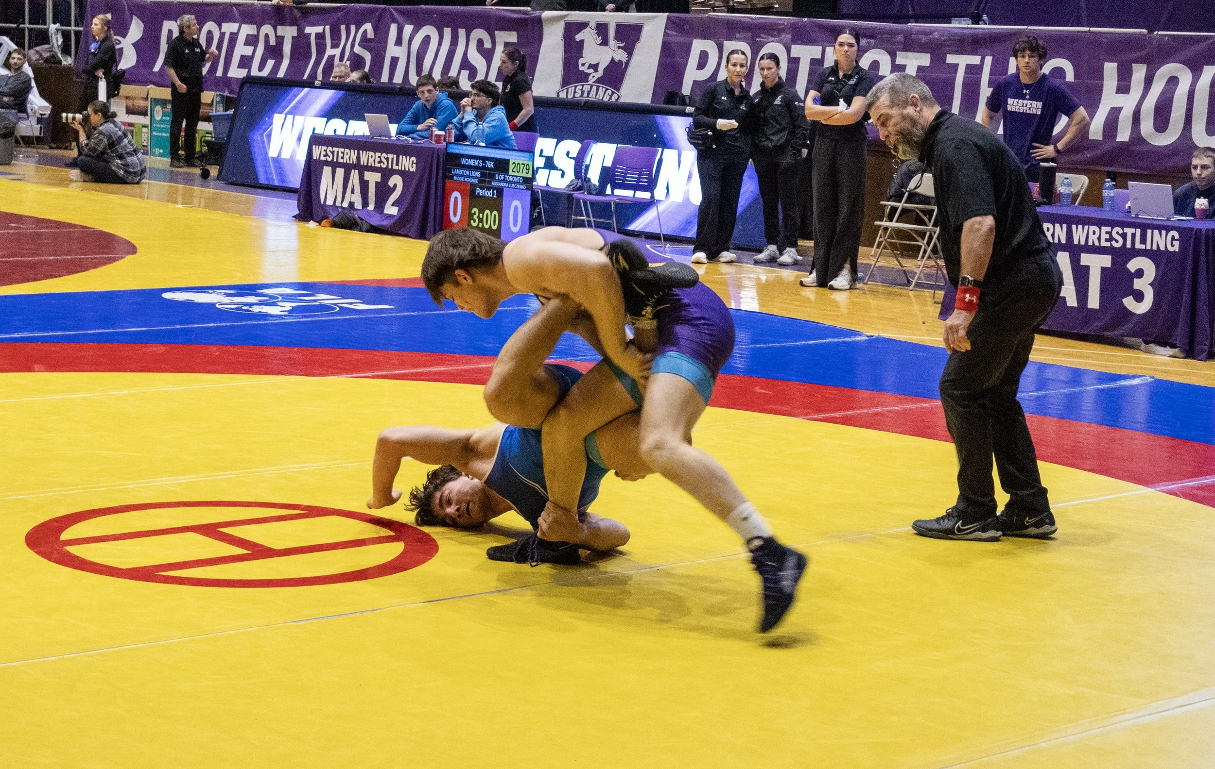 Western team captain Zachary Ortencio competes in a scramble during the 68-kilogram final at the Western Open at Alumni Hall on Jan. 18.  Photo by Jaidyn Lunn