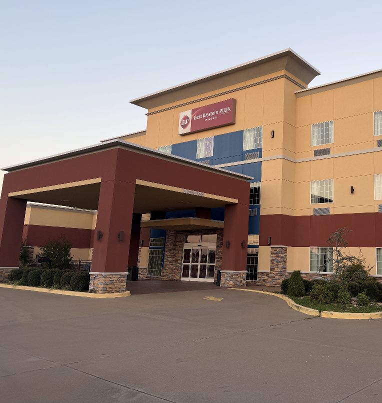 Mulch and seasonal plantings at hotel entrance