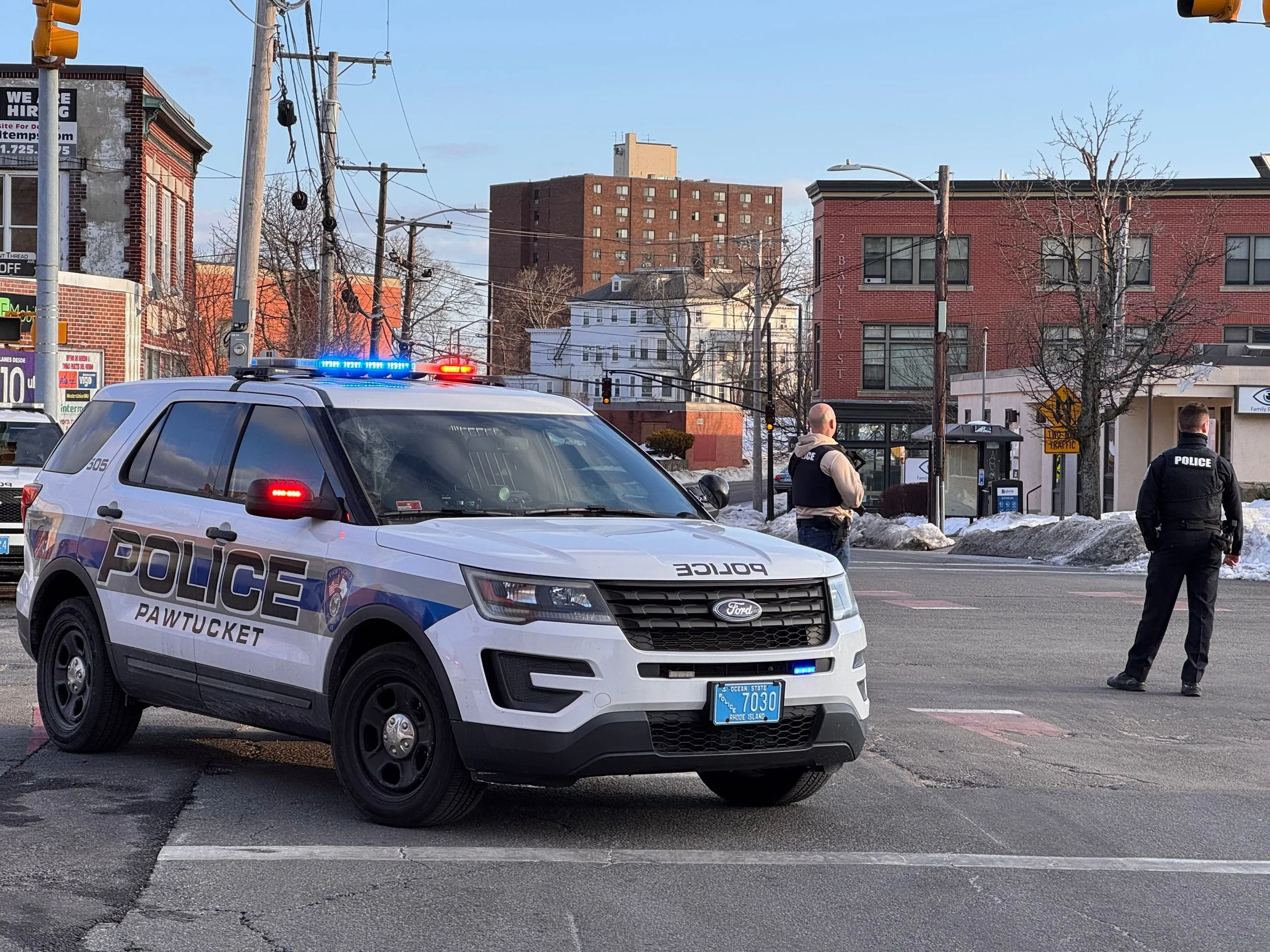 Police directing traffic at intersection