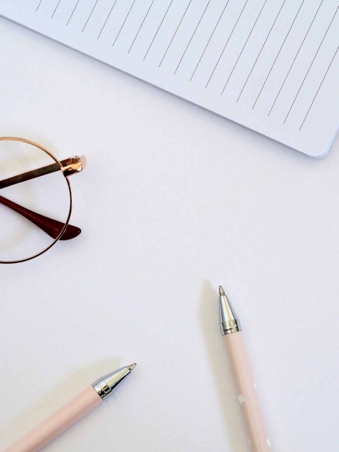 Notepad and pen representing what you accomplish in financial therapy