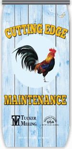 Sign for cutting edge maintenance with a rooster illustration, blue wooden background, and logo of Tucker Manufacturing, USA.