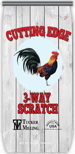 A wooden sign with a rooster illustration, advertising 'Cutting Edge 3-Way Scratch' for Tucker Milling Inc. USA.