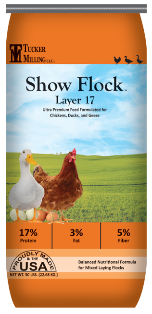 Bag of Tucker Milling Show Flock Layer 17 bird food with images of a duck and a chicken on the front, advertising balanced nutrition for chickens, ducks, and geese.