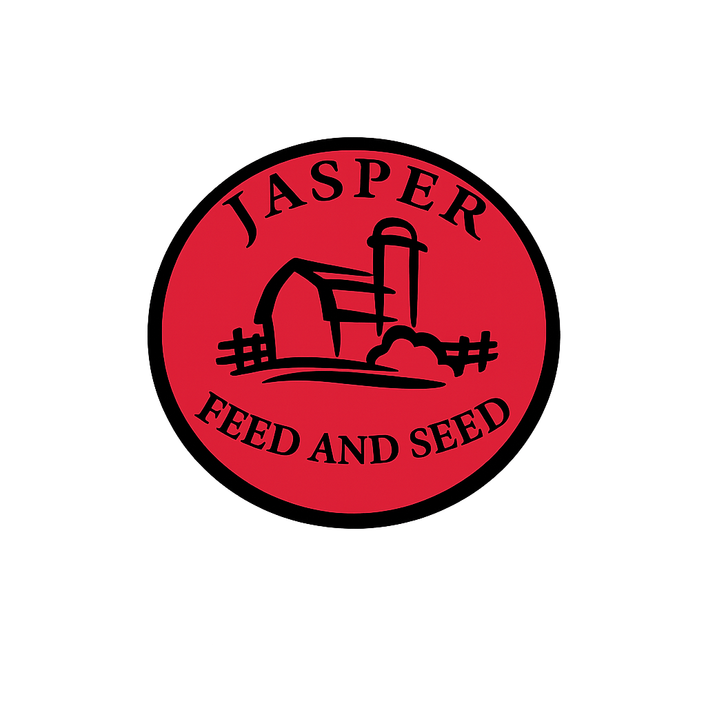 A circular logo with a red background, featuring an illustration of a farm with a barn and silo, and the text "Jasper Feed and Seed" surrounding the illustration.