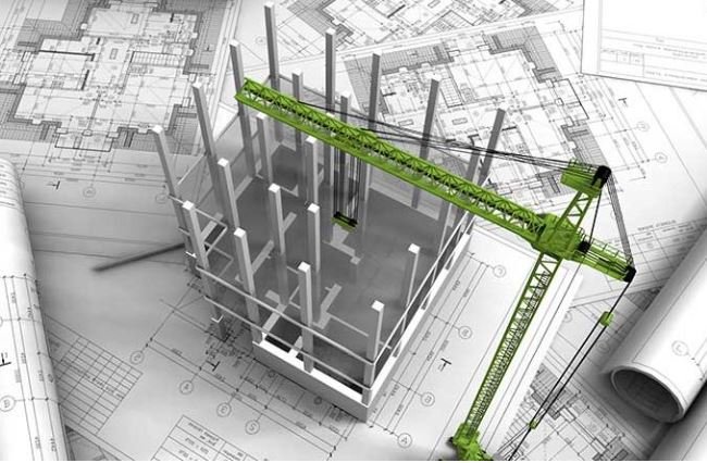 A scale model of a building under construction with a large green crane, set on top of architectural blueprints and technical drawings.