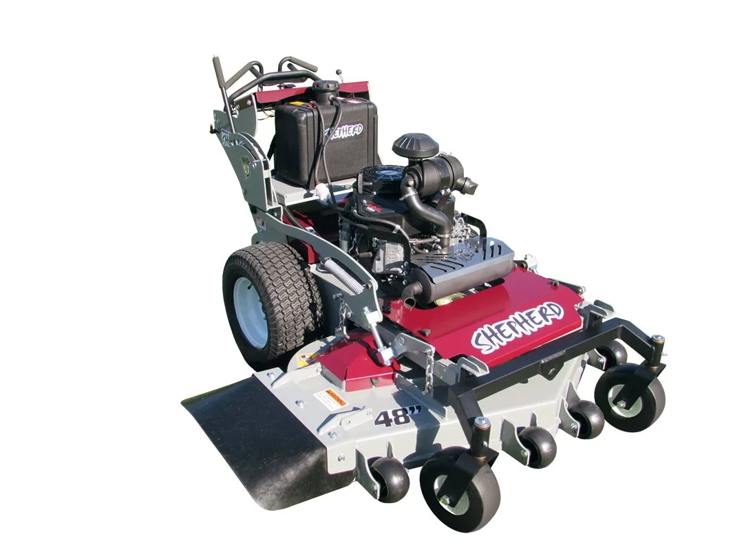 A ride-on lawn mower with red and gray body and the brand name "STEHERD" on the front, equipped with a gas engine and multiple wheels for maneuverability.