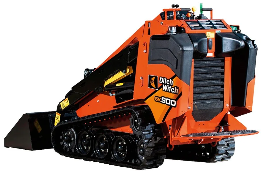 Orange and black Ditch Witch SK900 compact track loader with a bucket attachment, tracked undercarriage, and control cabin.