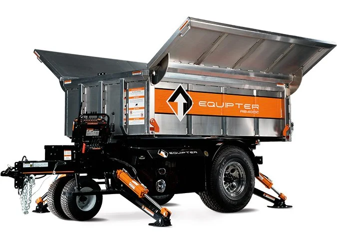 Heavy-duty utility trailer with hydraulic tilt bed, black and orange branding, and stabilizing legs, used for transporting equipment.