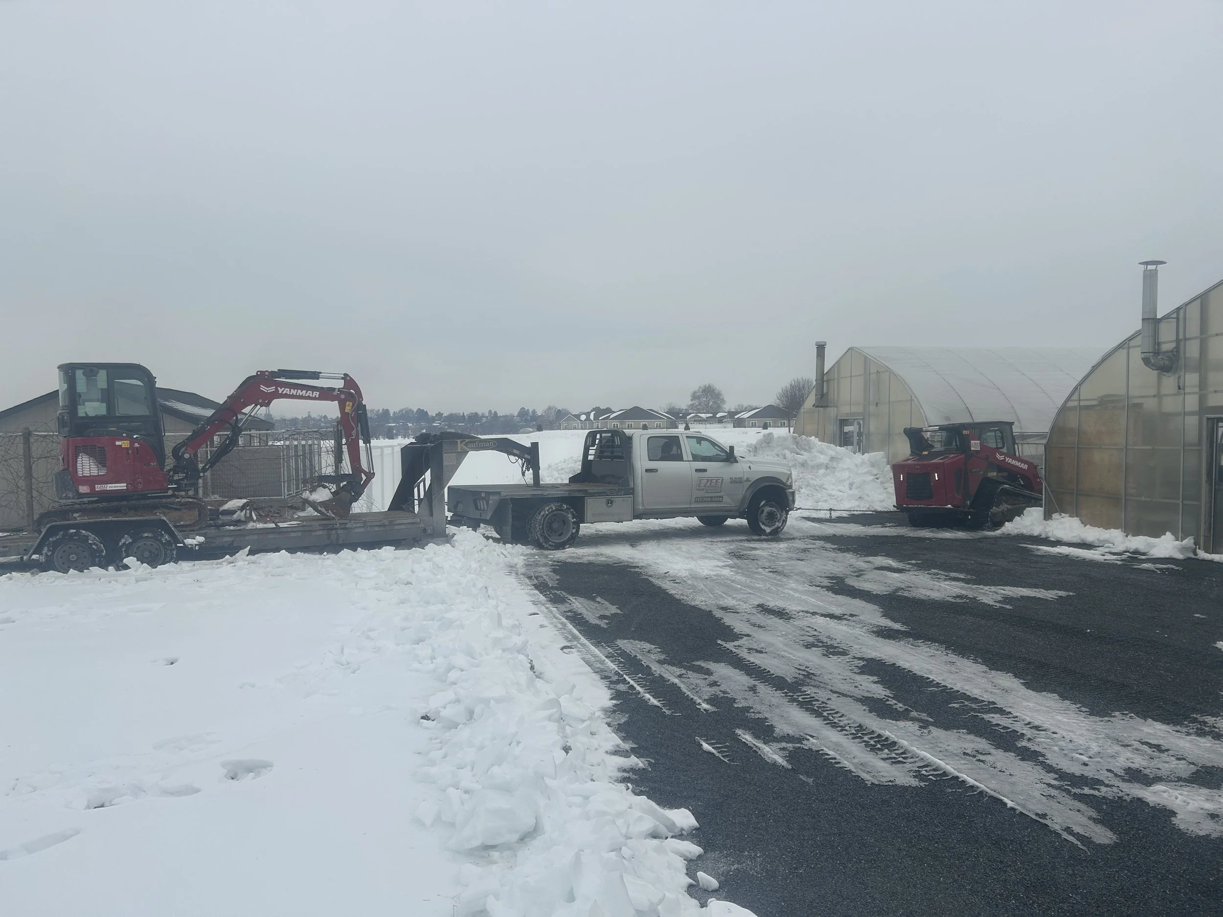 Snow on the ground doesn’t slow us down — it just makes the equipment look tougher. From the compact Yanmar excavator to the Honda-powered gear and the BTI van in the middle of it all, this lineup is ready for whatever the job throws at it. Cold morn