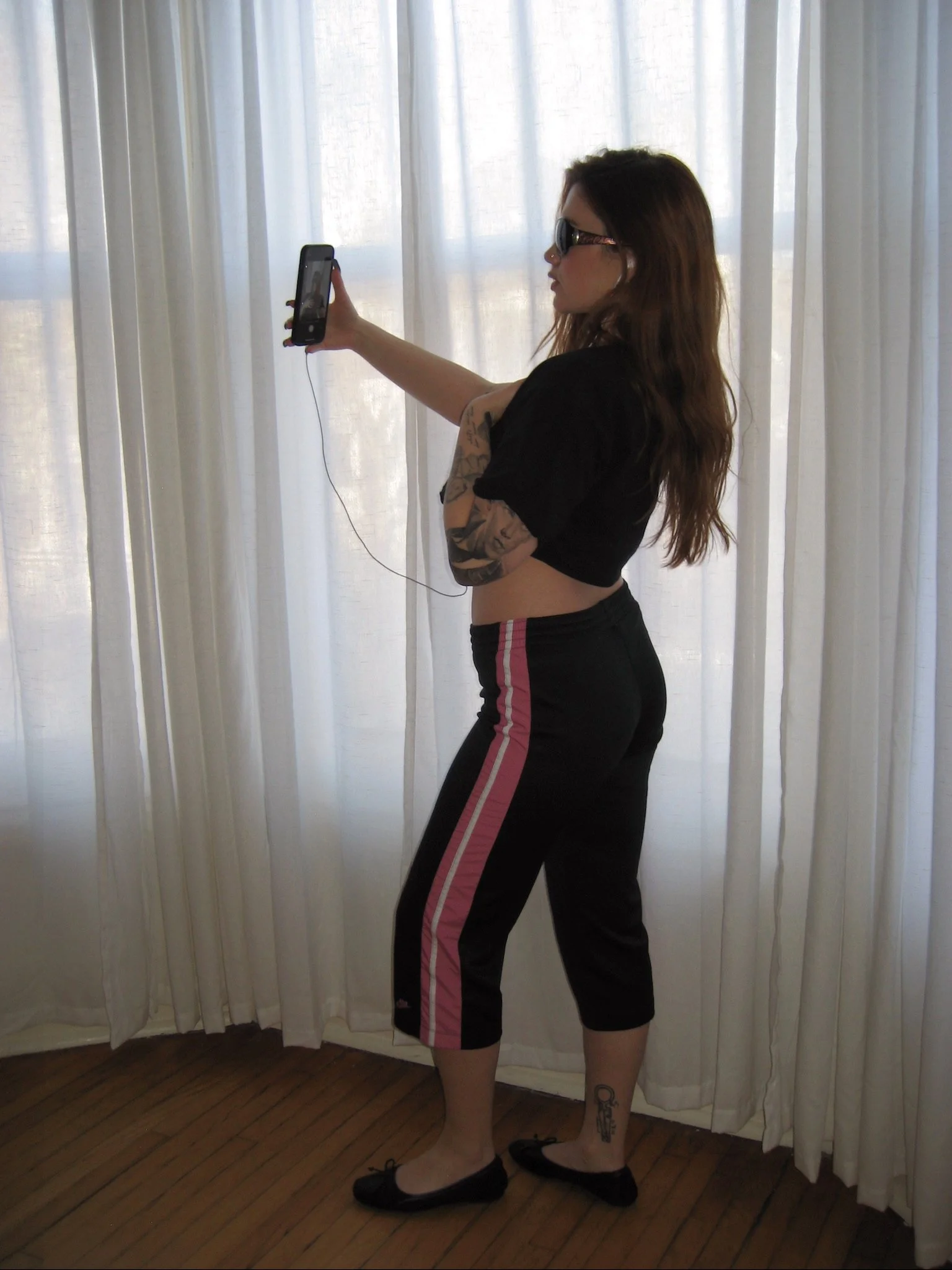 black & pink nike capris