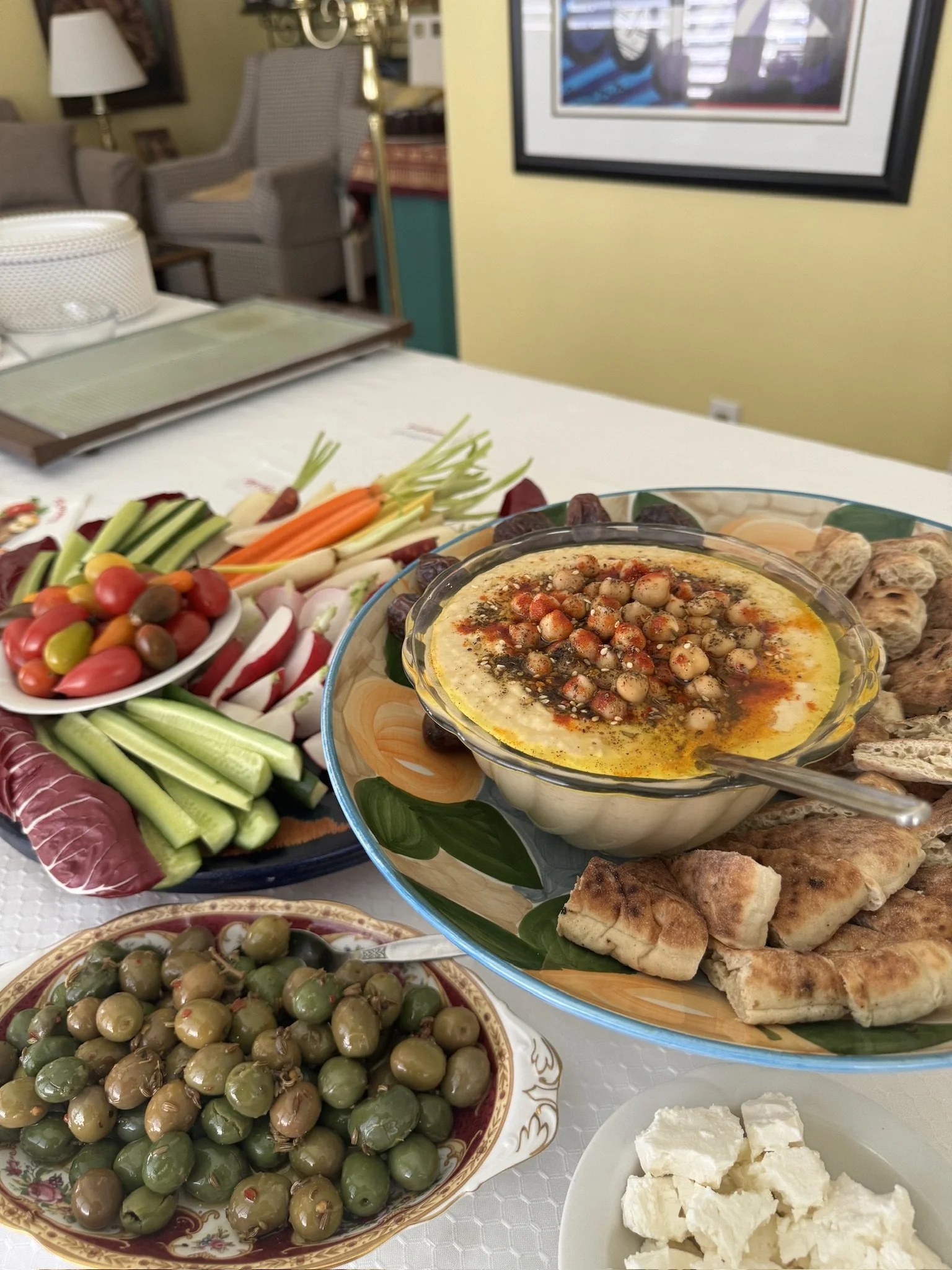 Marinated olives, crudités and a hummus and pita platter.