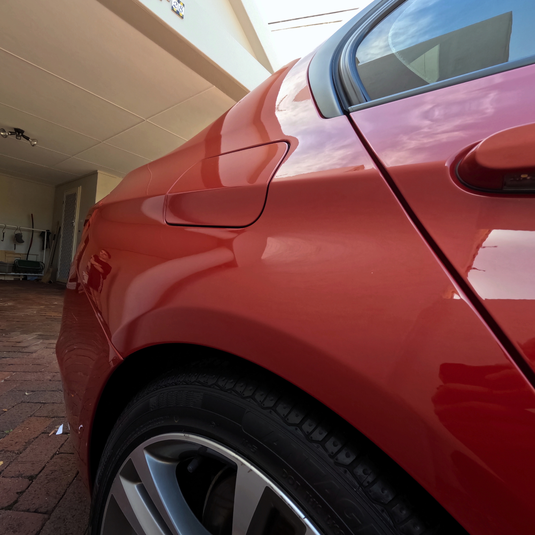 Pre-sale car detailing with paint enhancement on a red BMW 3 Series F30 in Perth. Professional gloss restoration and wax protection for maximum vehicle resale value.