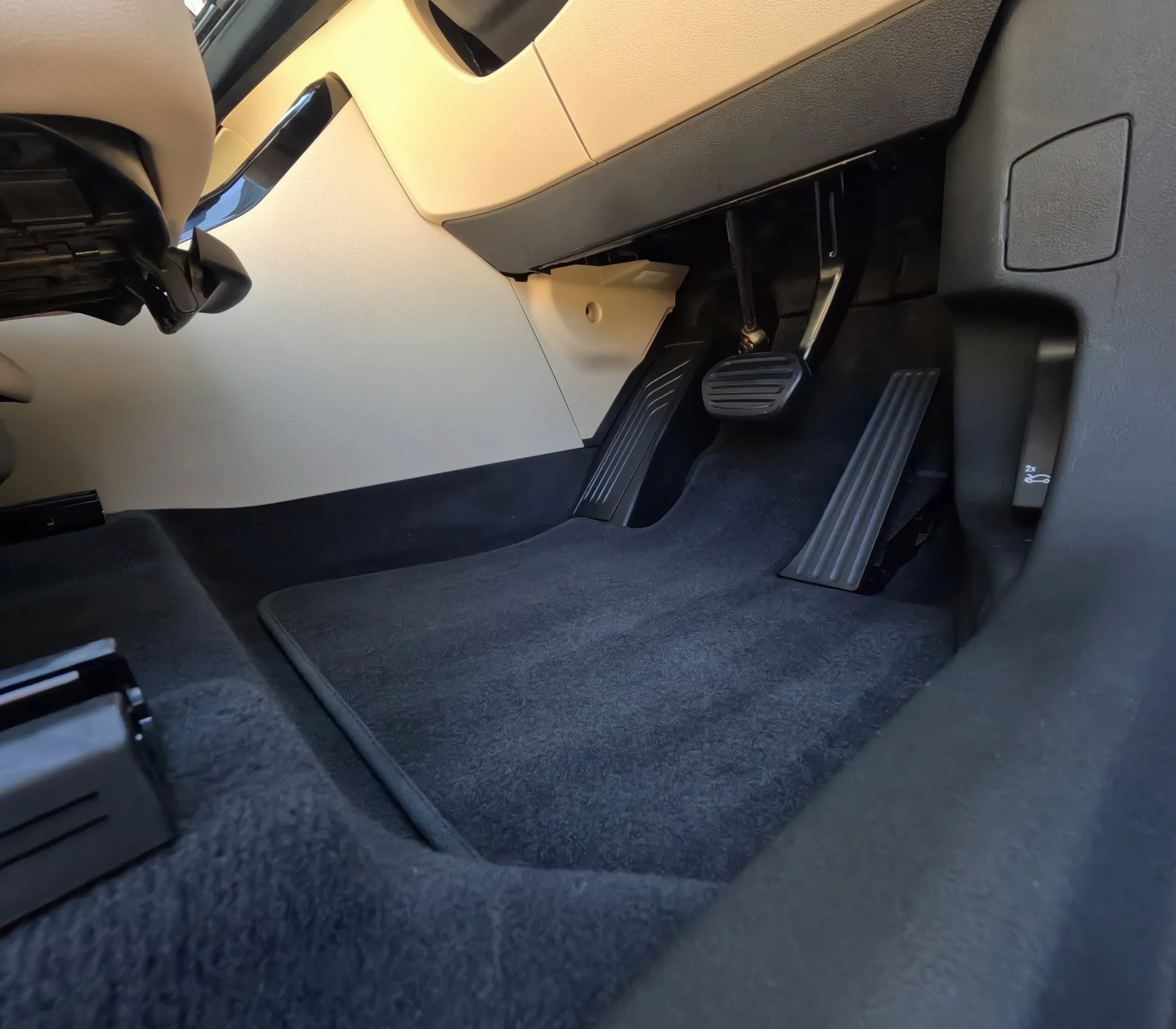 New car interior detailing and protection for a 2025 BMW X1 in Perth. Thorough cleaning and surface protection on carpets and pedals for a showroom-fresh finish.