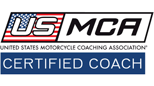 USMCA Certified Coach logo with the United States Motorcycle Coaching Association branding.