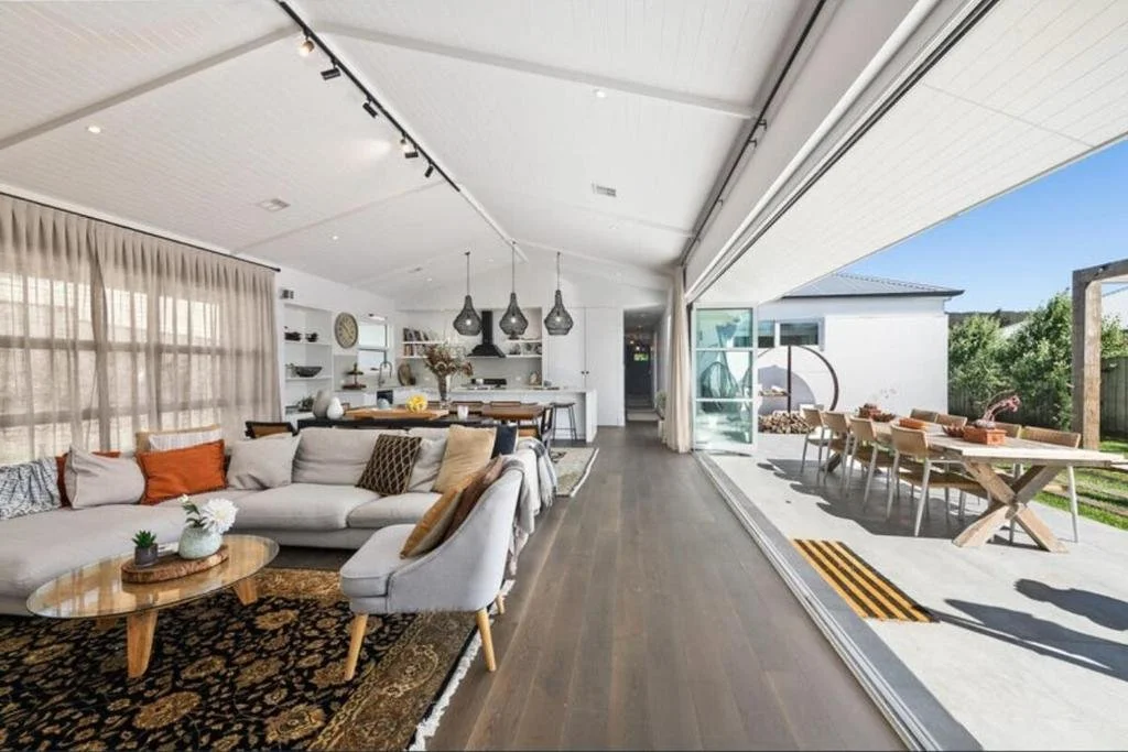 Spacious luxury living room at Fairfax Pavilion Bowral with fireplace