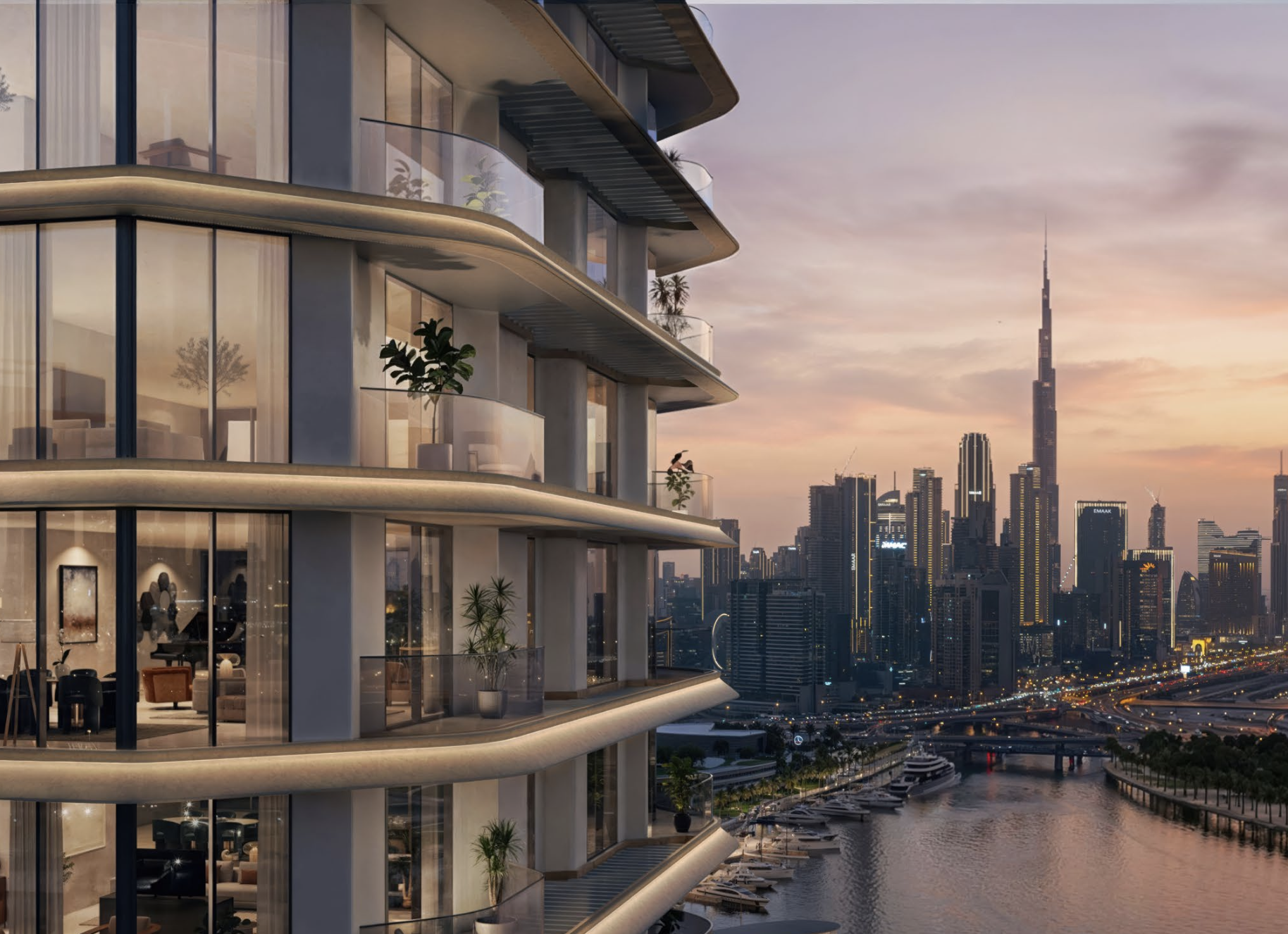 A high-rise building with curved balconies featuring glass railings, potted plants, and interior lights visible, overlooking a cityscape with tall skyscrapers, including the Burj Khalifa, near a waterway with yachts at sunset.