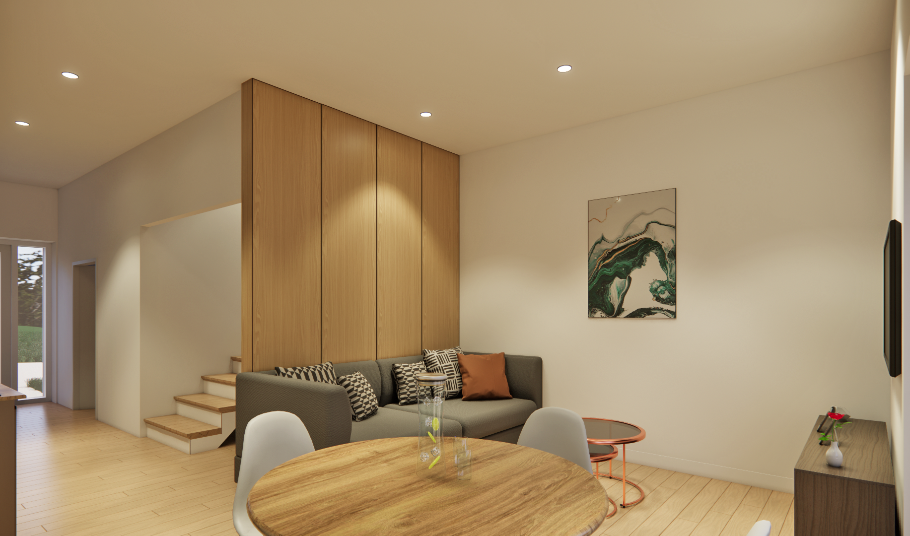 Moderne stue med træbord, sofa med sort-hvide puder, abstrakt vægkunst, og en lille sidebord med rød vase og blomst.