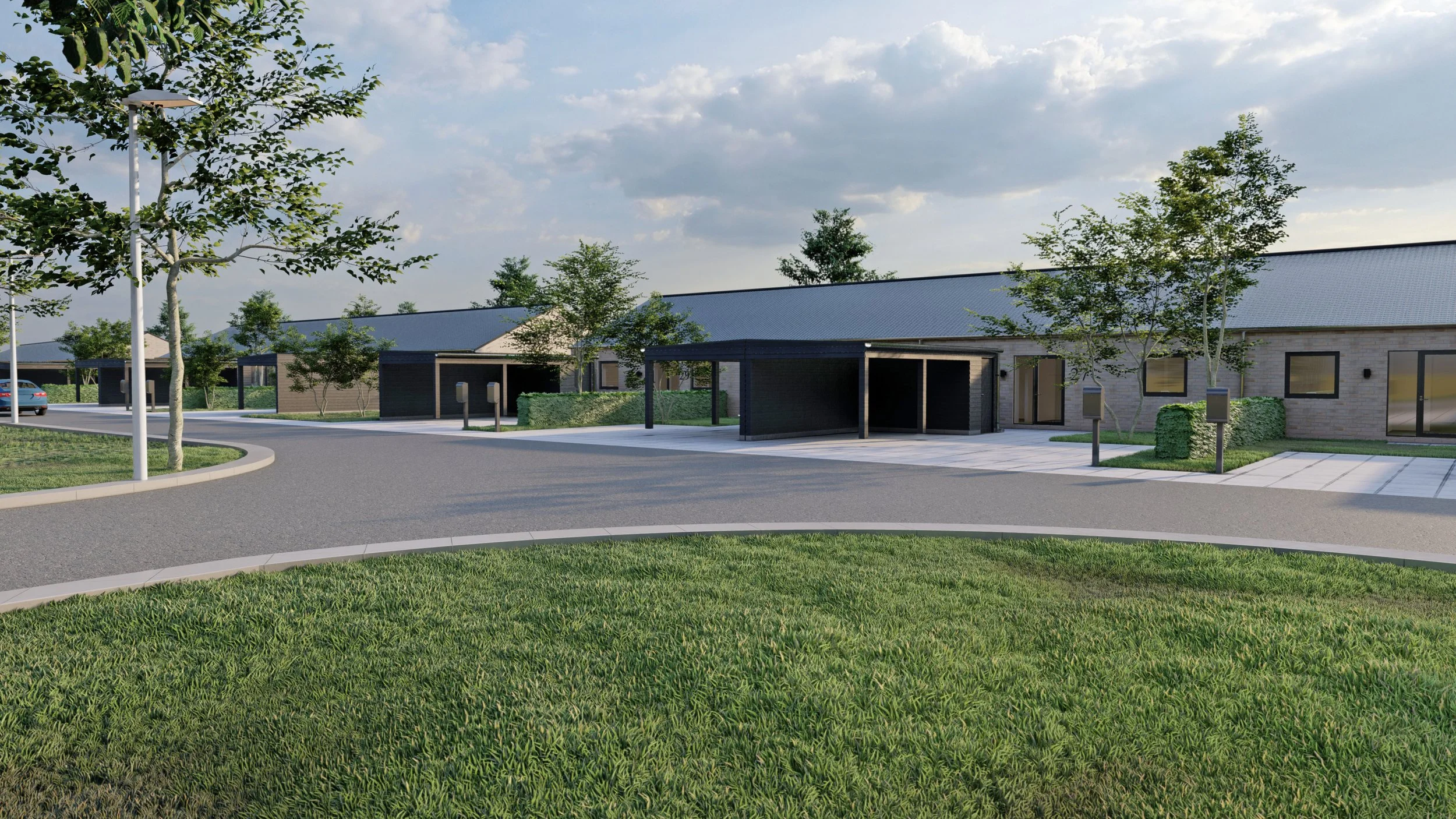 Moderne boligområde med enkeltindrettede huse, grønne træer og velholdte græsarealer under en skyet himmel.